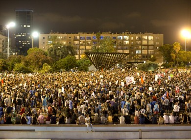 Israeli activists gather for pro-peace rally against a military solution to the Israeli Palestinian conflict in Tel Aviv, Israel on Saturday, 16 August 2014.