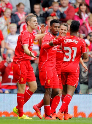 Daniel Sturridge is congratulated after his goal.