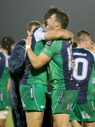 Quinn Roux and Robbie Henshaw embrace after beating Leinster.