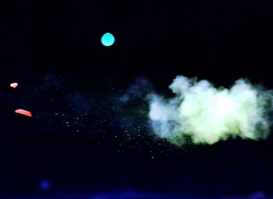A clay pigeon is shot during the ISSF World Cup in 2012.