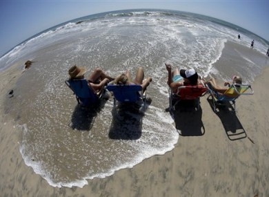 Beach goers cooling off during the Southern California heat wave.