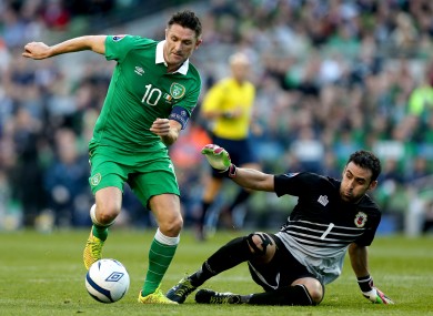 Ireland captain Robbie Keane and Gibraltar goalkeeper Jordan Perez.