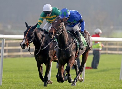 Ruby Walsh pulls away from Mark Walsh to take the victory.