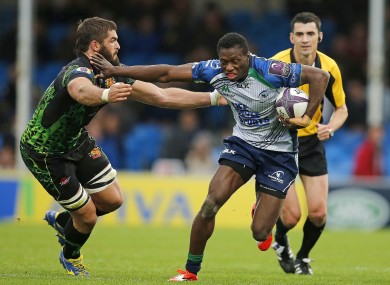 Adeolokun hands off Exter's Don Armand during their Challenge Cup clash last month.