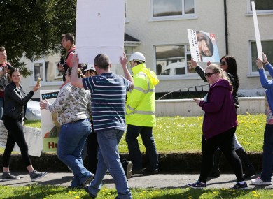 Irish Water workers are confronted by local residents in Raheny.