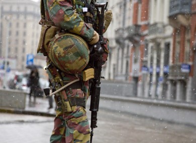 A Belgian soldier patrols in front of EU headquarters in Brussels on Monday.