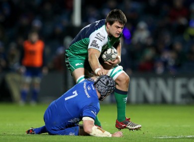 Roux runs through Shane Jennings in Connacht's clash with Leinster on 19 December.