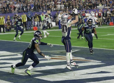 New England Patriots wide receiver Danny Amendola (80) catches a 4-yard touchdown pass in front of Seattle Seahawks free safety Earl Thomas.