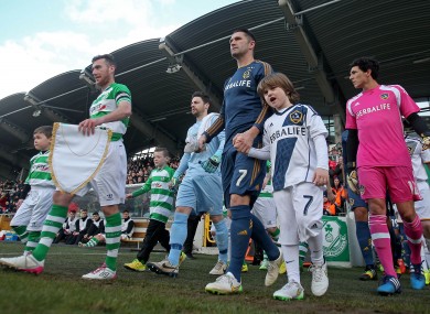 The captains lead their teams out at Tallaght Stadium.
