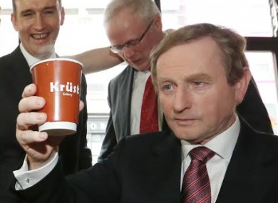 Enda Kenny with a cup of coffee that maybe he wishes was a pint.