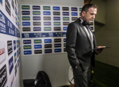 Damian Lawlor goes through his notes.