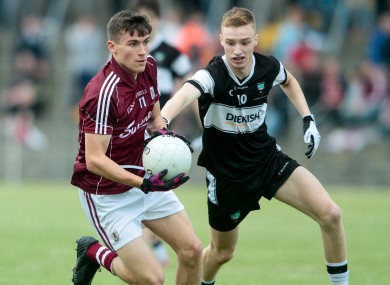 Galway's Finnian Ó Laoi is pursued by Liam Gaughan of Sligo.