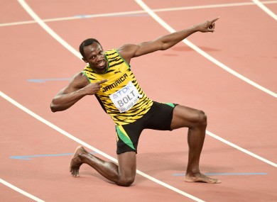 Jamaica's Usain Bolt celebrates after winning the gold medal in the Men's 200 Metres final.