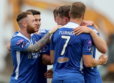 The Limerick players celebrated with goalscorer Vinny Faherty.