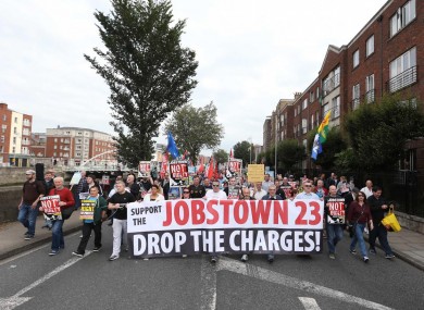 Protesters marched from the Central Bank up to the Courts of Criminal Justice in Dublin.
