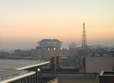 The fog lingering over Dublin city centre this morning.