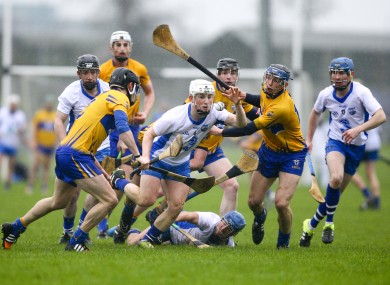 Waterford's Andy Molumby surrounded by Clare defenders in Carriganore today.