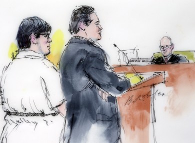 In this courtroom sketch, Enrique Marquez, left, appears with his defense attorney Young Kim in federal court in Riverside, California.