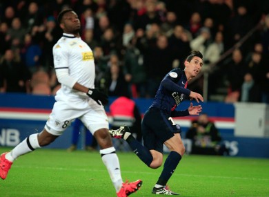 Angel di Maria watches his second goal all the way to the net.