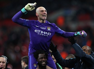 Caballero is hoisted onto the shoulders of team-mate Wilfried Bony.