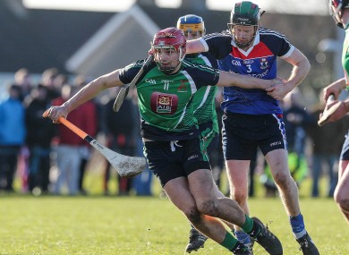 Limerick IT's Peter Duggan is challenged by Ger Teehan of Waterford IT.