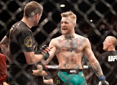 John Kavanagh and Conor McGregor celebrate following the win against Jose Aldo at UFC 194 in December.