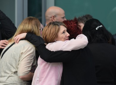 Justice: Familes of the 96 hug outside the Hillsborough inquests in Warrington.