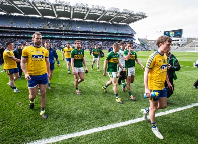 Roscommon players troop off after yesterday's defeat in Croke Park.