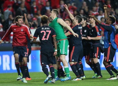 Munich players celebrate after the Champions League quarter-final second leg.