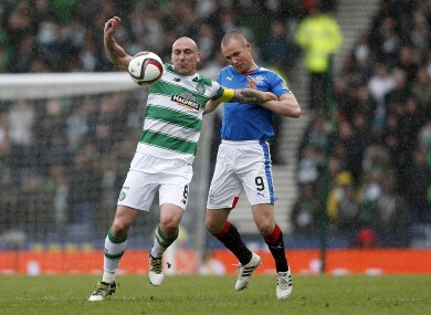 Brown battles with Rangers striker Kenny Miller in the recent Scottish League Cup semi-final at Hampden Park.
