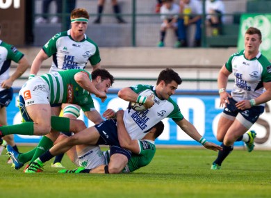 Connacht's Tiernan O’Halloran is tackled.