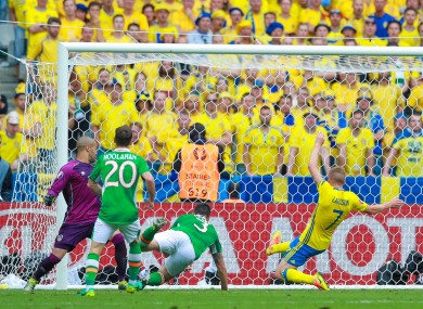 Clark puts the ball into his own net.
