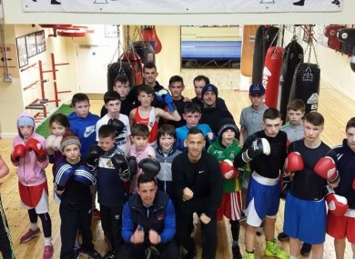 The coaches pose with some of the young fighters of Crumlin Boxing Club.