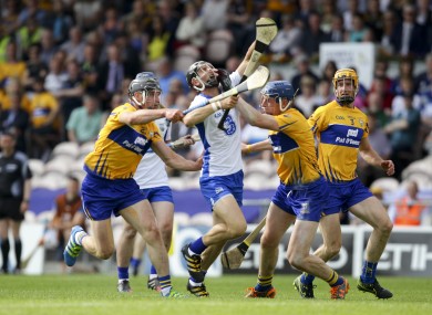 Maurice Shanahan tries to burst past the Clare defence.