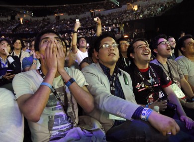 Audience members react to an announcement at Sony's Playstation 4 event last year.