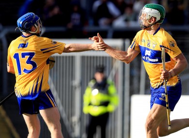 Aaron Shanagher celebrates scoring Clare's fourth goal with Podge Collins