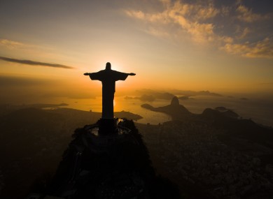 The sun rising behind the Christ the Redeemer statue in Rio de Janeiro earlier this week