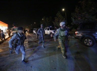 Afghan security forces rush to respond to a complex Taliban attack on the campus of the American University in the Afghan capital Kabul.