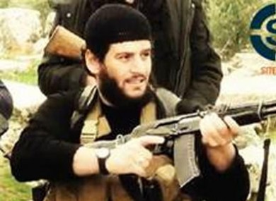 Undated militant image shows Abu Muhammed al-Adnani, the Islamic State militant group's spokesman, who IS say was