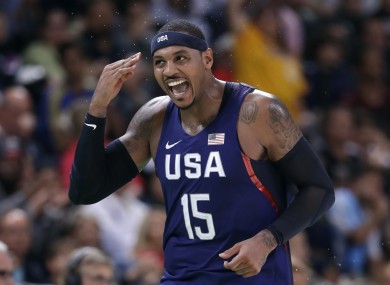 United States' Carmelo Anthony (15) celebrates after making a three-point basket during a basketball game against Australia at the 2016 Summer Olympics.