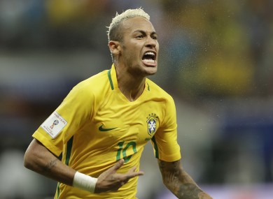 Brazil's Neymar celebrates scoring his side's second goal against Colombia during a 2018 World Cup qualifying soccer match in Manaus.