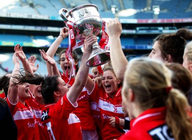 Cork captain Ciara O'Sullivan leads the celebrations with the Brendan Martin Cup.