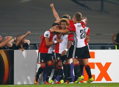Feyenoord's Tonny Trindade, centre, celebrates after scoring the opening goal.