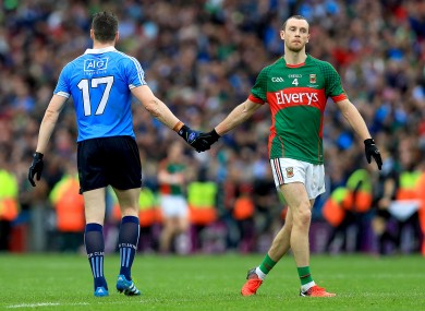 Paddy Andrews and Keith Higgins shake hands after last Sunday's game.
