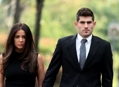 Footballer Ched Evans arrives at Cardiff Crown Court with partner Natasha Massey.