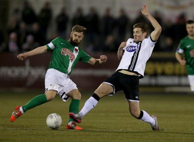 Greg Bolger and Patrick McEleney battle for the ball when Dundalk and Cork met earlier this year.