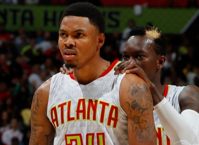 Dennis Schroder and Kent Bazemore of the Atlanta Hawks