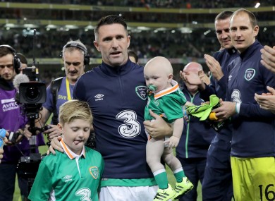 Keane with sons Robert and Hudson after his final game for Ireland.