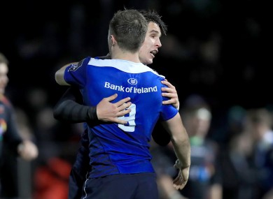 Luke McGrath and Joey Carbery celebrate Leinster's fourth try.