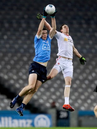 Dublin's Brian Fenton and Tyrone's Colm Cavanagh rise for the ball.